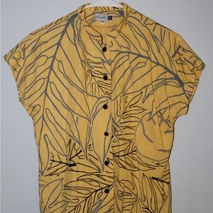 A button up yellow sig zane shirt